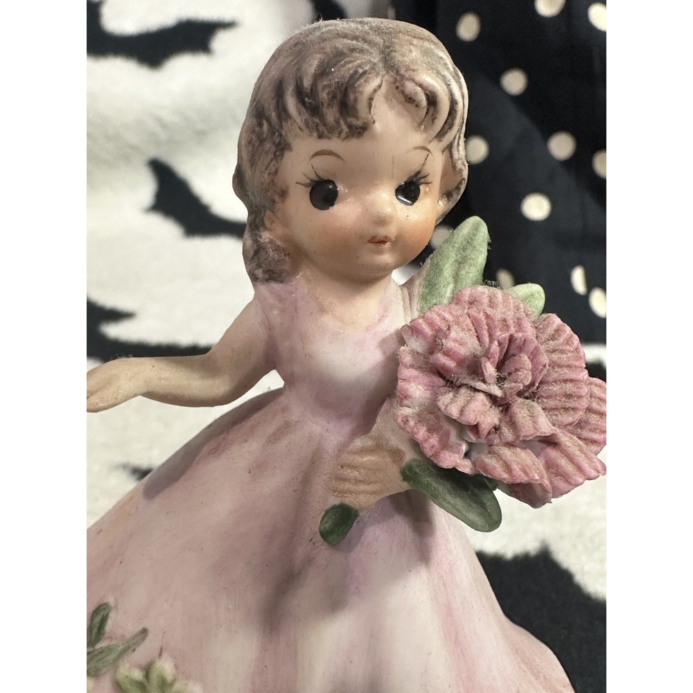 Vintage Josef. January black Eye Carnation Figurine. Adorable !